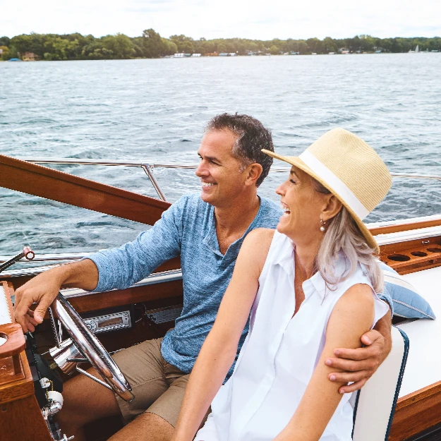 Man, woman and ocean adventure or together in boat